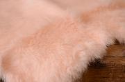Tissu en fourrure rose bébé