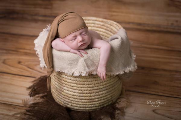 Light brown long stitch hat with knot