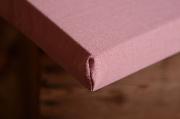 Colchón con funda rosa palo