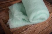 Decke aus Wolle in Aquagrün