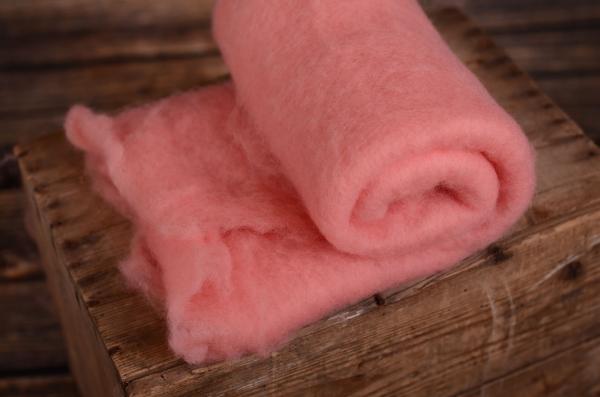 Couverture en laine rose