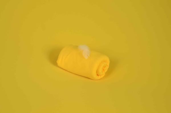 Tissu en tricot jaune