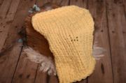 Light yellow plaited blanket
