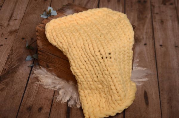 Light yellow plaited blanket