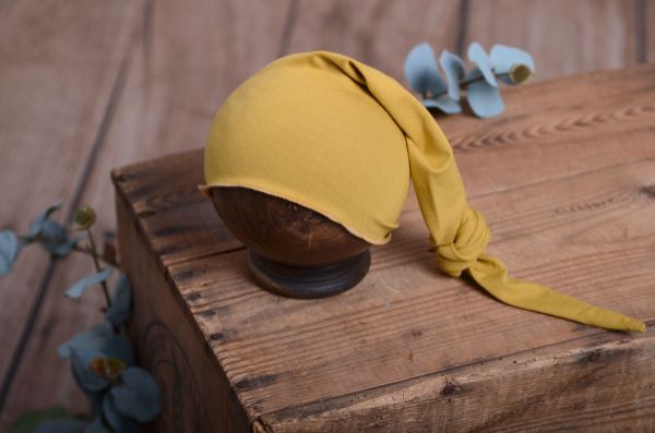Mustard long stitch hat with knot