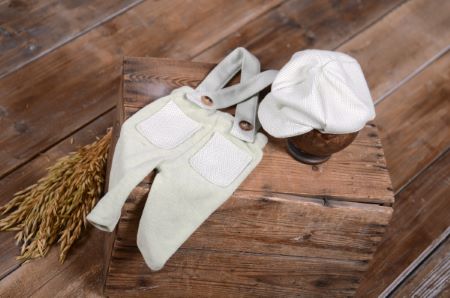 Light green dungarees and cap set