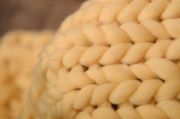 Light yellow plaited blanket