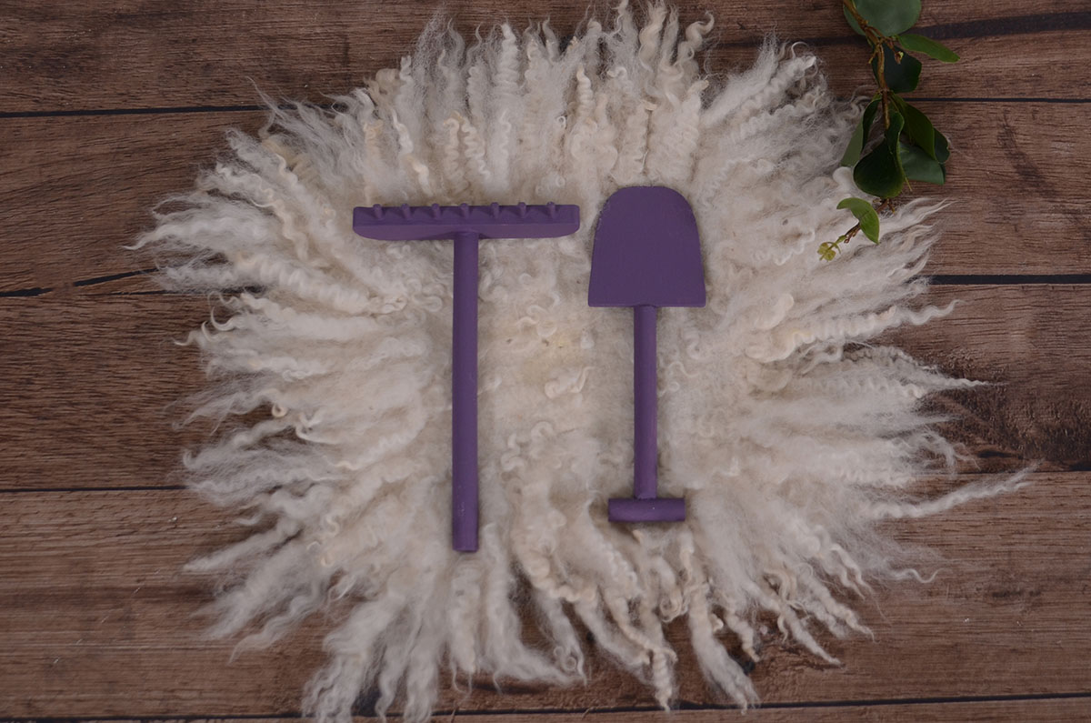 Purple spade and rake