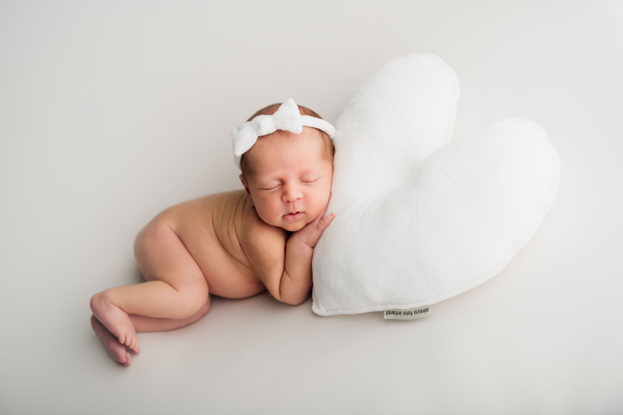 Off-white headdress and pillow set