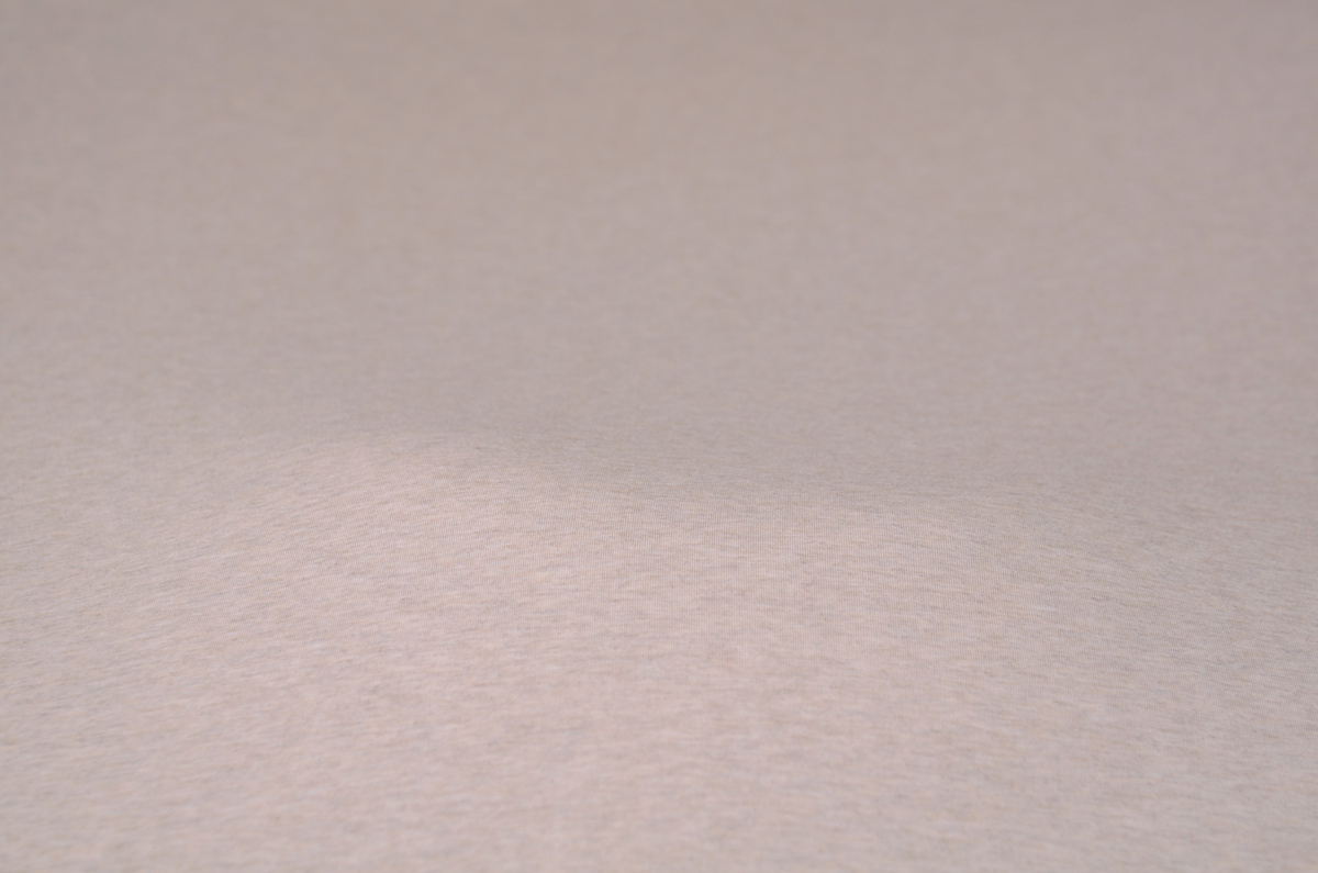 Mottled beige smooth fabric