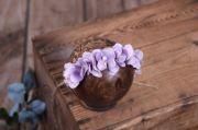 Coiffure florale en corde lilas