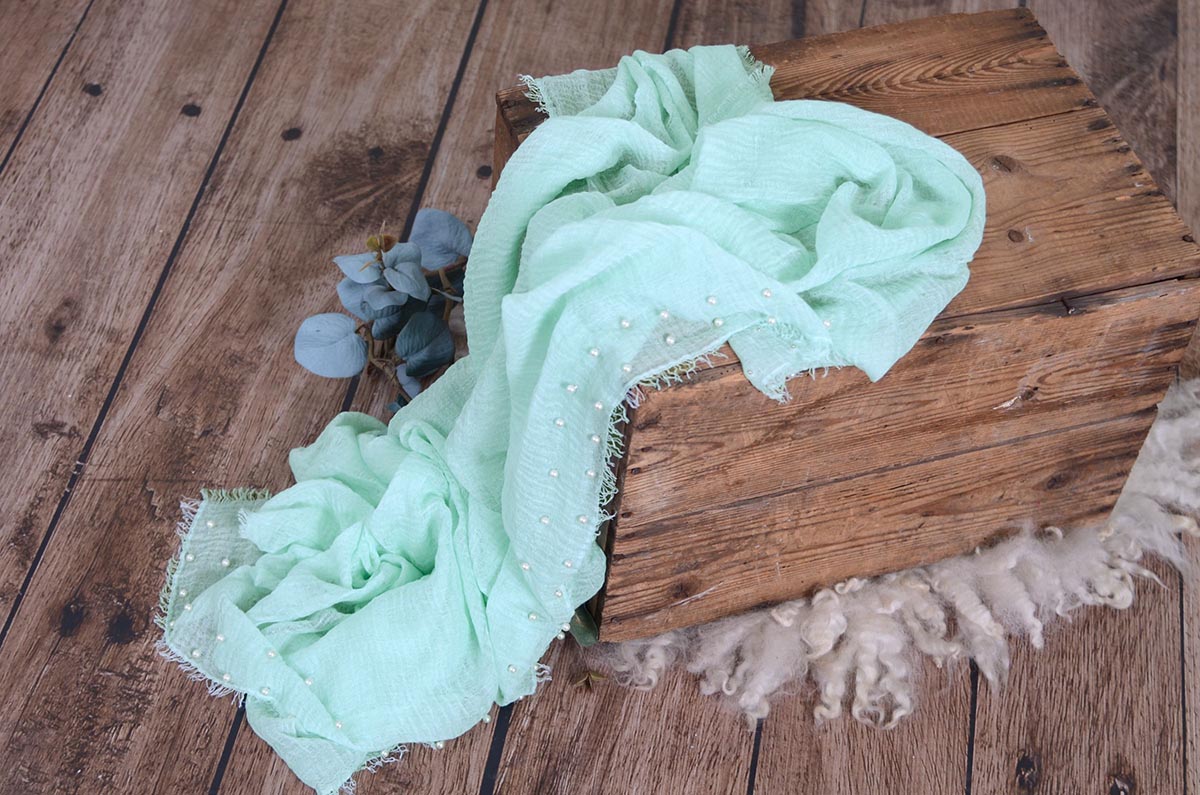 Mint green wrap with pearls