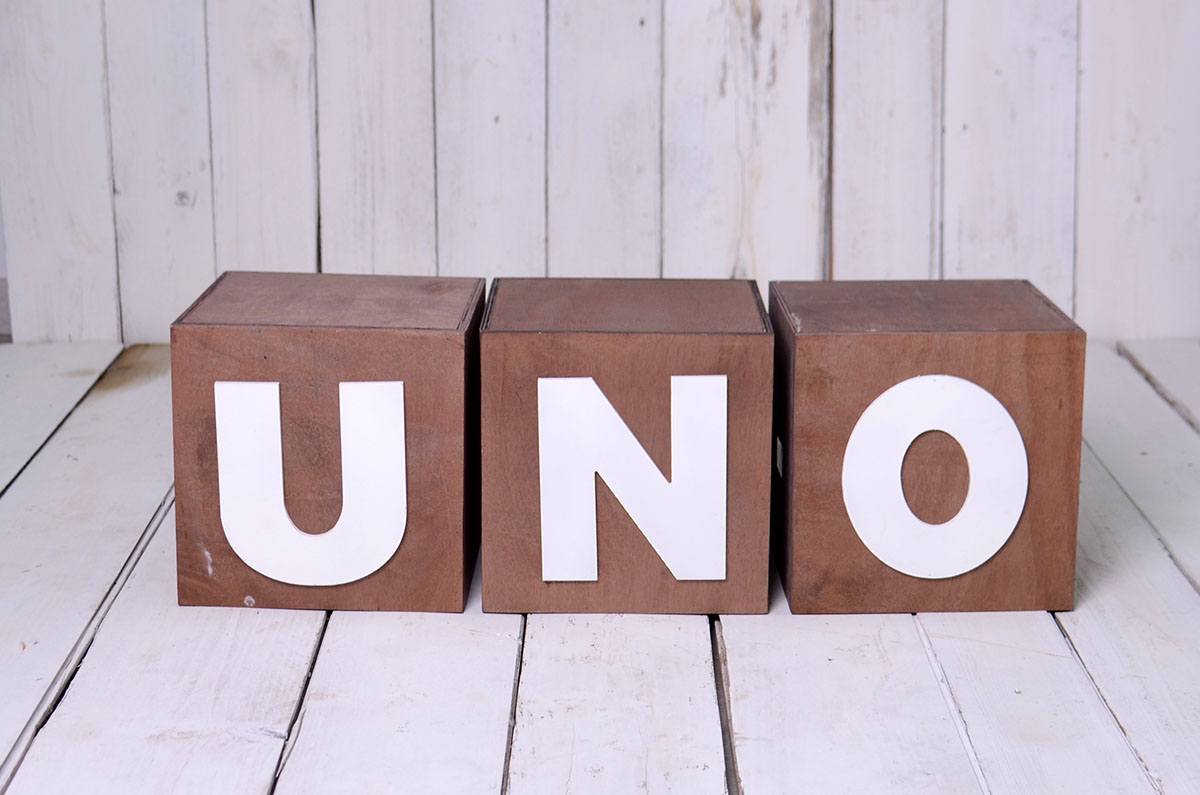 Set of three brown uno-dos cubes