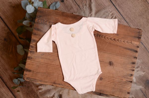 Baby pink stitch long-sleeve bodysuit
