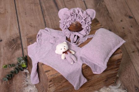 Pyjamas, bonnet, pillow, and cuddly toy set