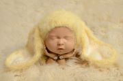 Yellow fur hat with rabbit ears