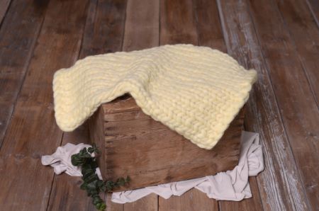 Light yellow plaited blanket
