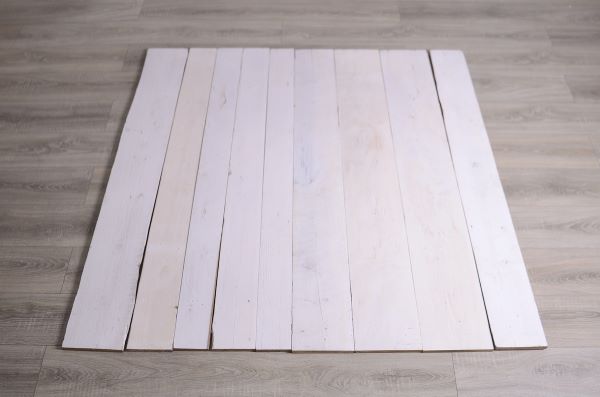 Two-coloured rustic wood plank flooring