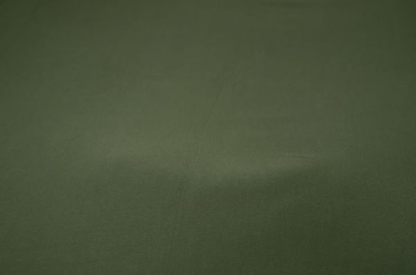 Dark green smooth fabric