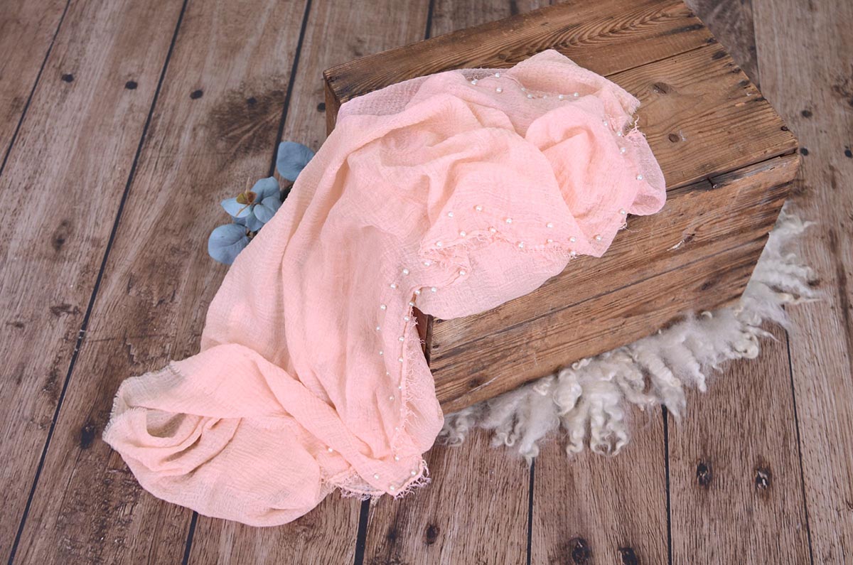 Pink wrap with pearls