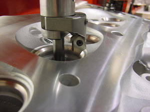 Valve seat cutting on a V8 cylinder head