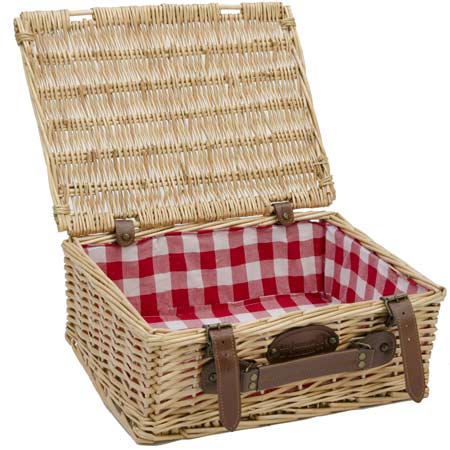 Empty wicker basket with red and white fabric