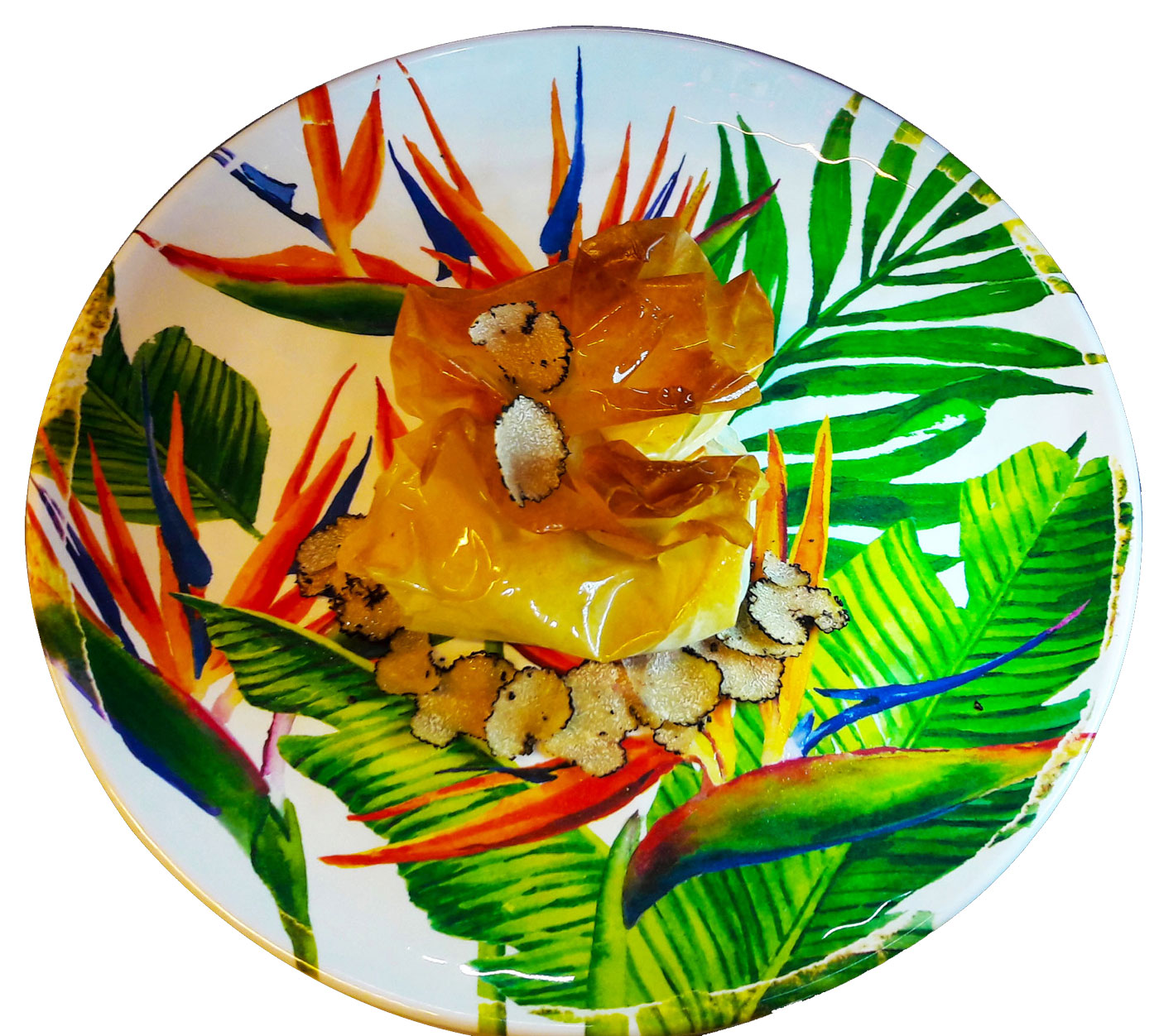 Dressage recette œufs cachés à la truffe sur assiette du thème fleurs exotiques